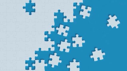 Graphic of blue puzzle pieces