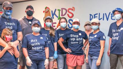 A group shot of the BrandExtract team at Kids' Meals Inc.