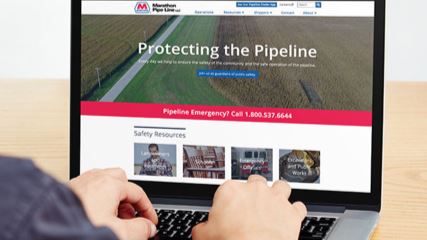 A user visiting the Marathon Pipe Line website on a laptop.