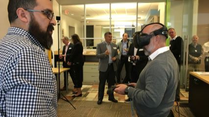 Clients utilizing VR/AR technology at BE's office.