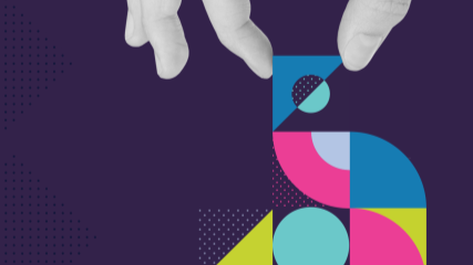 Black and white photograph of fingers placing a blue geometric shape on a BrandExtract-branded geometric design