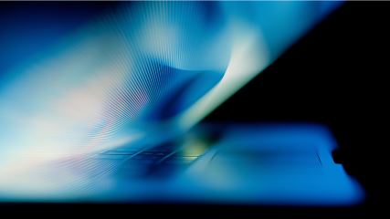 Graphic with the HubSpot logo connecting to icons representing mobile, headphones, laptop, megaphone and the cloud.