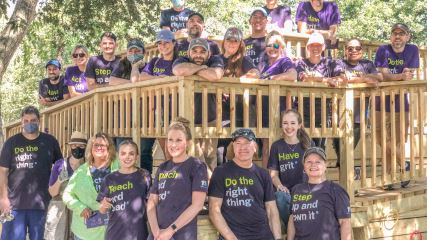 BrandExtract team posing at Special CHEERS service project