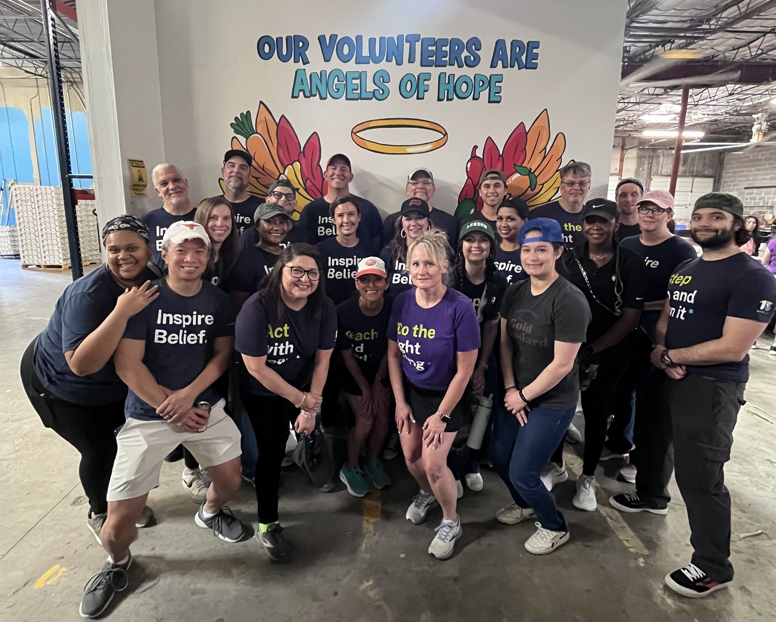 The BrandExtract team smiling together after completing a day of volunteer service at the Houston Kidz Mealz