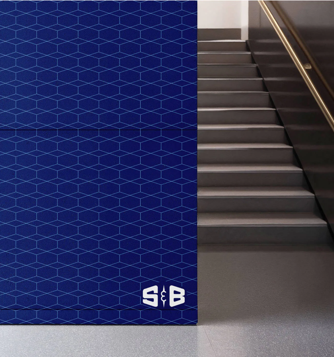 S&B branded wall paper next to a set of stairs